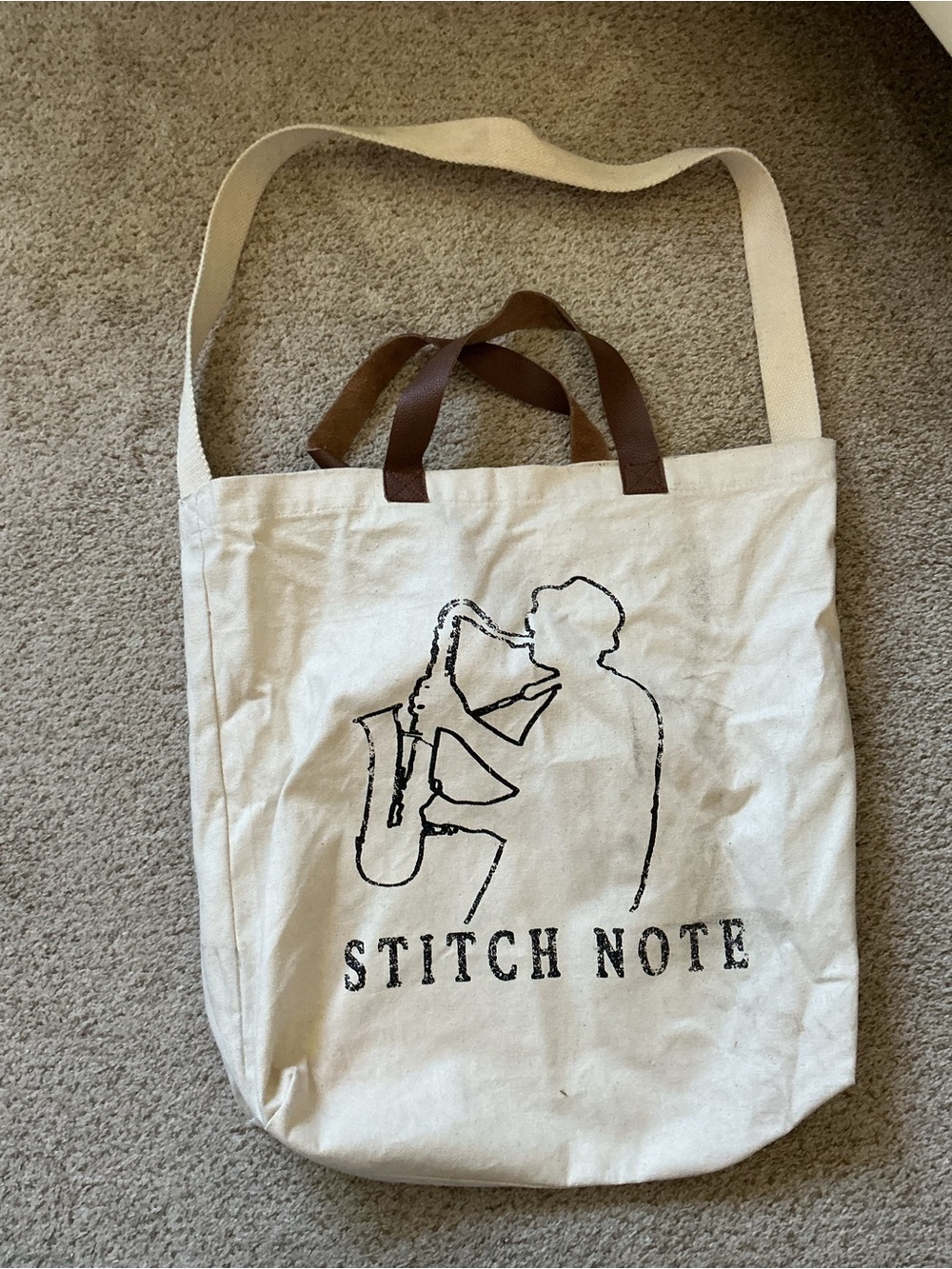 Stitch Note Cream Canvas Tote with Black Saxophone Print and Brown Handles